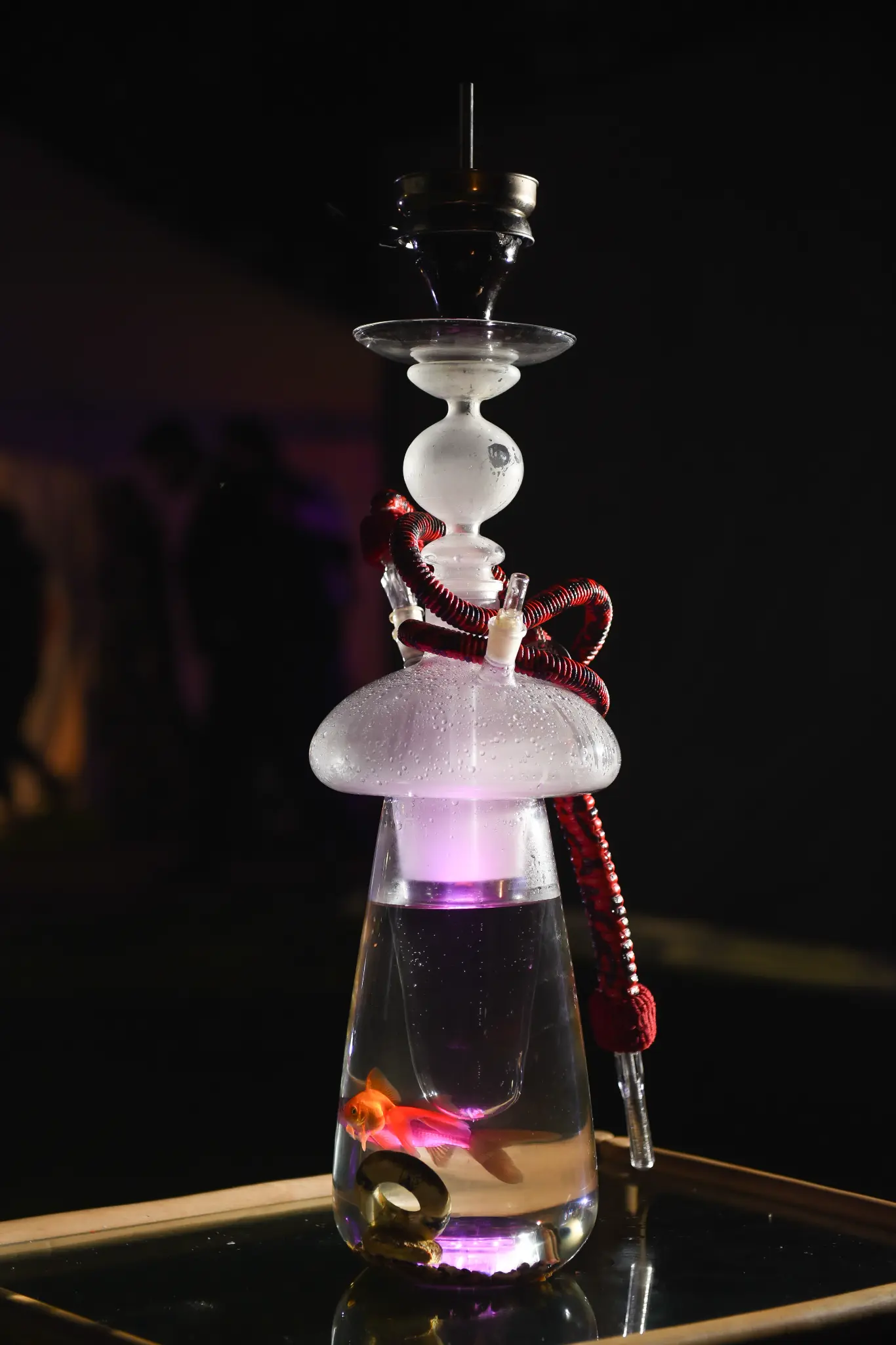 Elegant white shisha pipe with LED lighting at luxury event